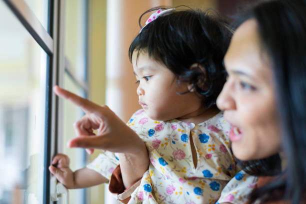 istock Mother and daughter having a playful time together 959833154