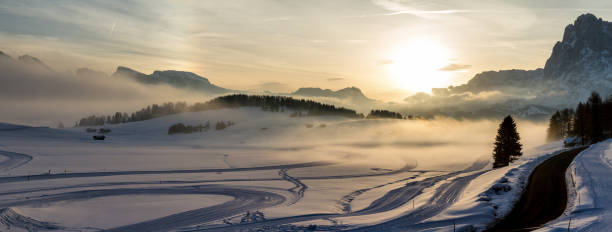 Panoramic aerial view of Seiser Alm at sunrise Panoramic aerial view of Seiser Alm at sunrise catinaccio stock pictures, royalty-free photos & images