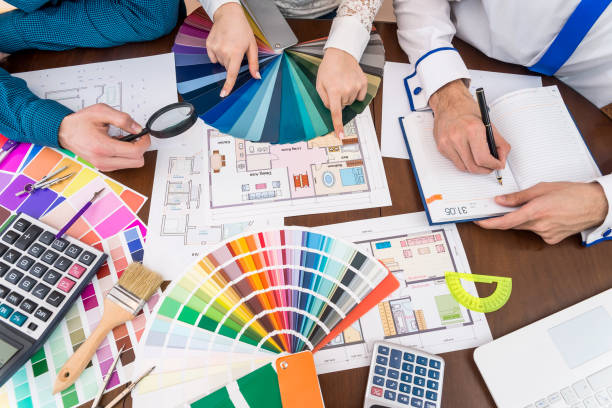 istock Top view of designer's workspace, discussing colour sampler 959842694