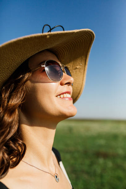 istock Woman with summer hat 959848988