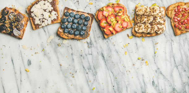 istock Vegan whole grain toasts with fruit, seeds, nuts, copy space 959852522