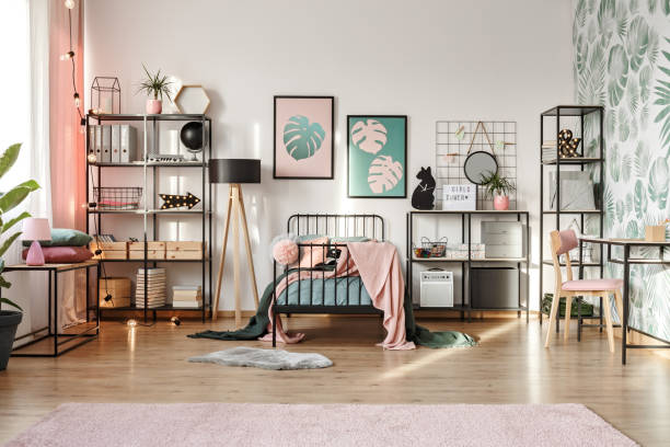 istock Pink decorations in botanical bedroom 959852914