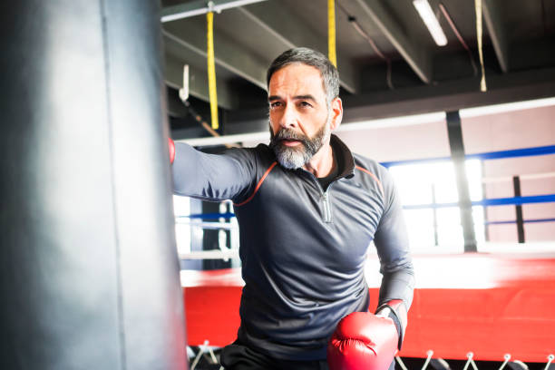 istock People exercising at gym 959856002