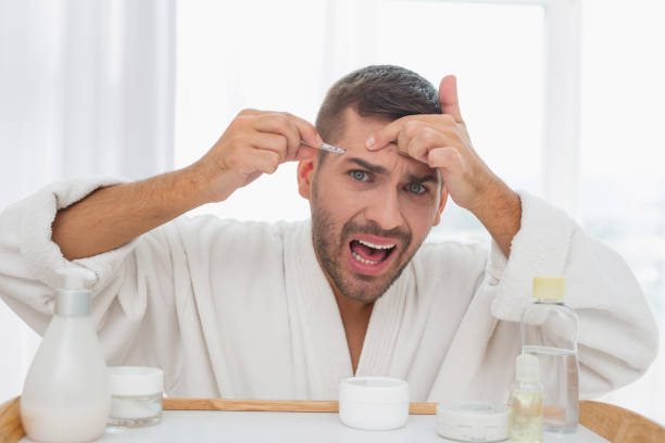 istock Unhappy young man feeling pain 959864350