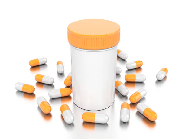istock Orange pill battle with red pills 959864762