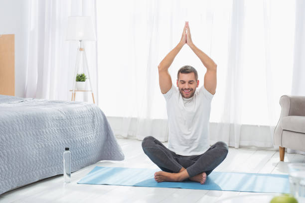 istock Nice peaceful man holding his arms up 959865704