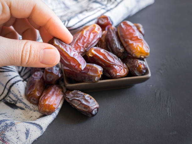 istock palm fruit in a bowl. turkish and islamic ramadan fruit 959865758