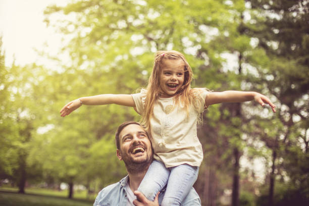 istock Smiling daughter with father. 959868426