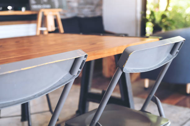 istock Wooden tables and chairs in cafe 959868668