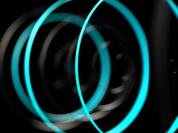 istock Abstract futuristic rings shape with neon light 959873224