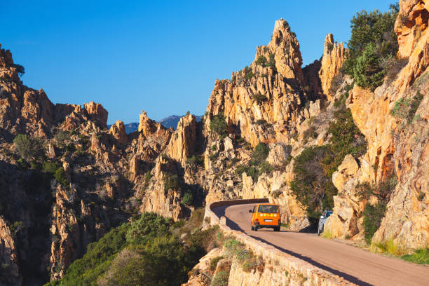 Road along the famous Calanques de Piana in Corsica, France stock photo