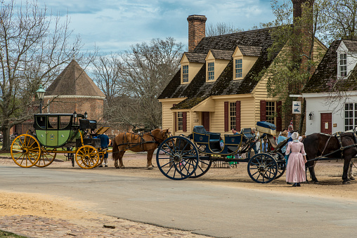 Williamsburg, Virginia , USA - April 1, 2018 : Horse drawn carriage tours in British Colony in Williamsburg, Virginia, USA.