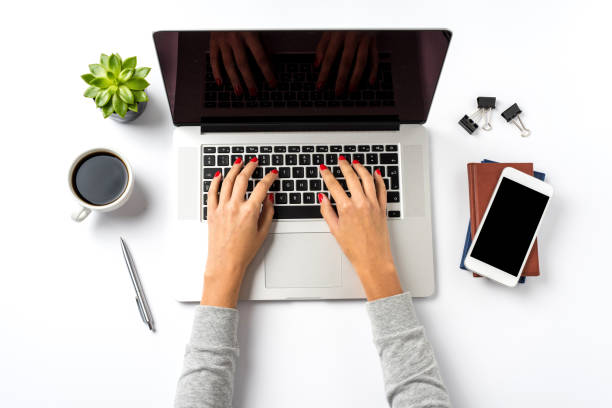 istock Woman working on laptop. Close up 959880706