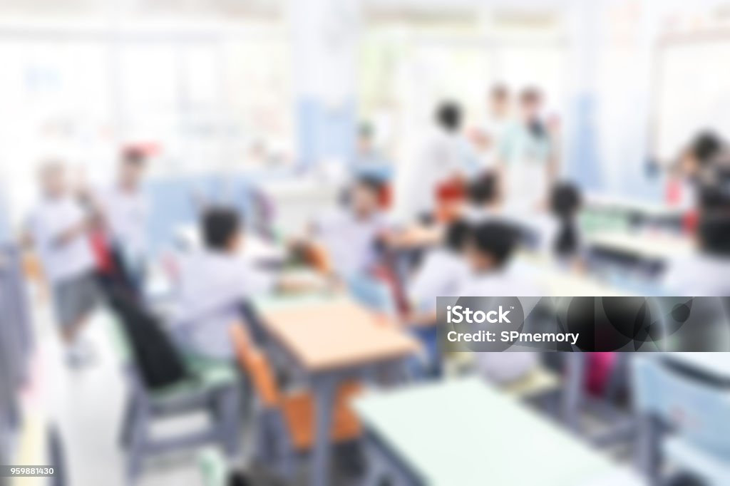 Blurred primary school with parent and children in background.Defocus open house day at for kindergarten students. Classroom Stock Photo