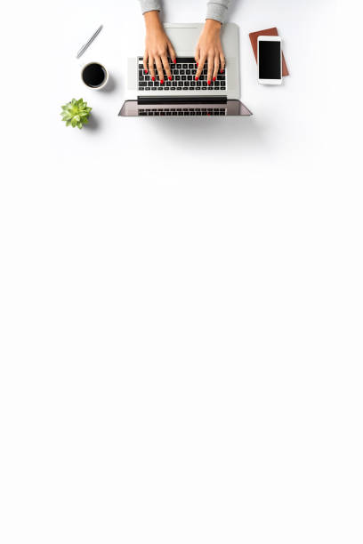 istock Overhead shot of office desktop 959884278
