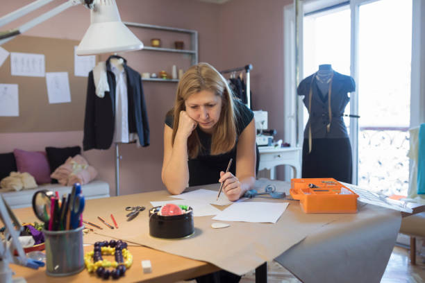 istock Fashion Designer Working In Their Art Studio 959887728