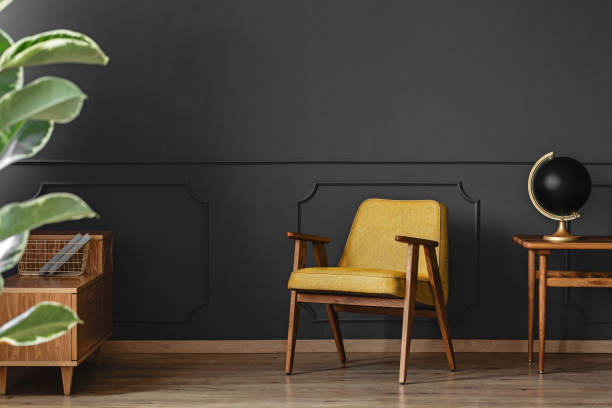 istock Leaves, armchair and globe 959892242