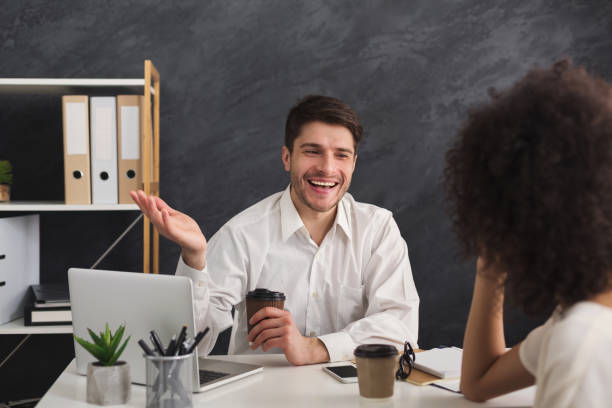 istock Couple of business partners work at modern office 959901034