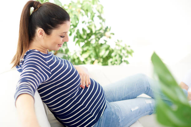 istock Pregnant woman relaxing at home 959909910