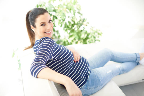 istock Happy woman enjoying her pregnancy 959909930
