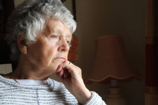istock senior woman with serious expression 959910434