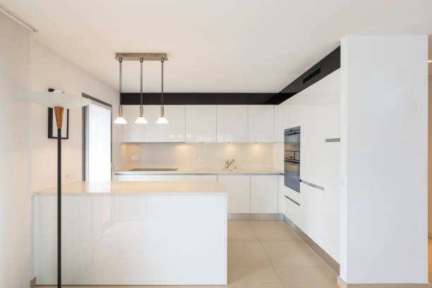 istock Elegant modern white kitchen in apartment 959911758