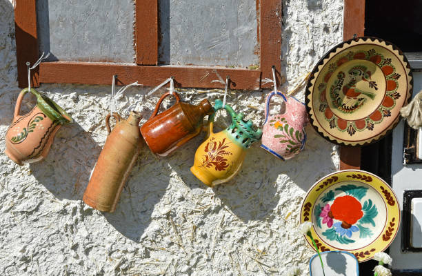 istock Jugs and plates on the wall as decoration 959915654