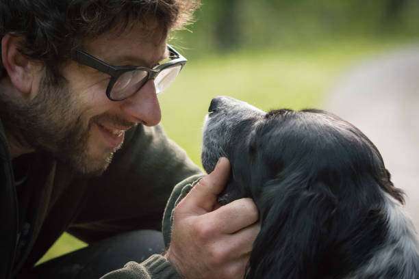 istock love and affection between man and his dog 959919690