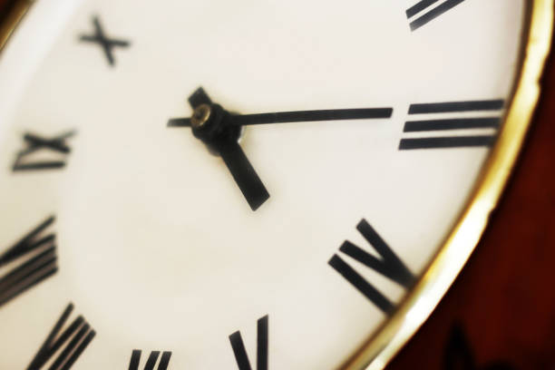 istock Closeup of classical clock, Roman numerals clock 959919898