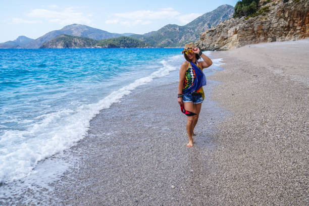 istock Women walking on the beach 959922628