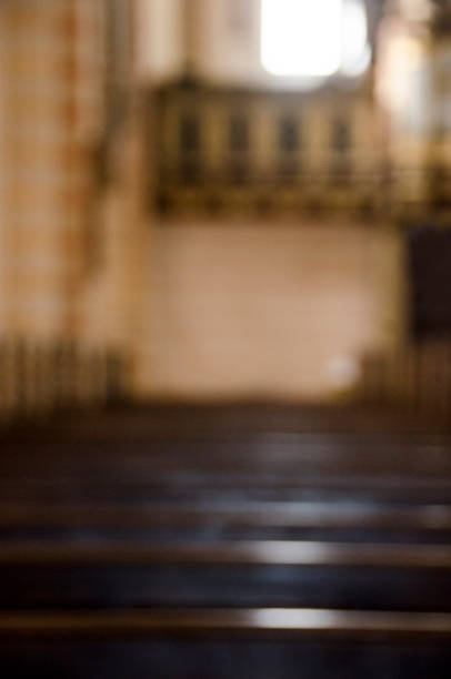 istock Unsharp background picture og the benches in church 959922654
