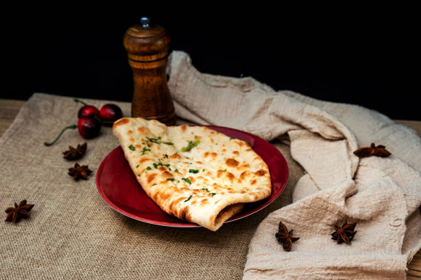 istock traditional Indian Naan garlic bread 959923872
