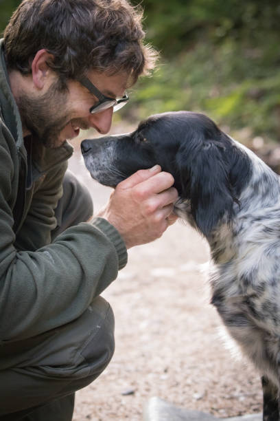 istock love and affection between man and his dog 959924688