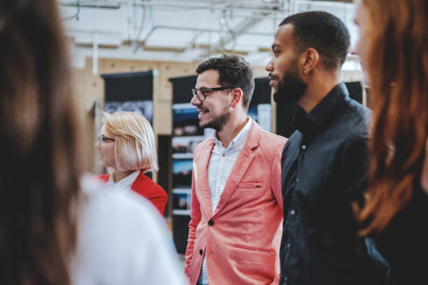 istock Young design professionals talking in the office 959929144