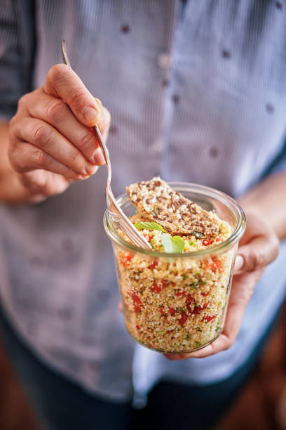 istock Couscous with Paprika, Tomato, Fresh Mint and Crispbread 959929792