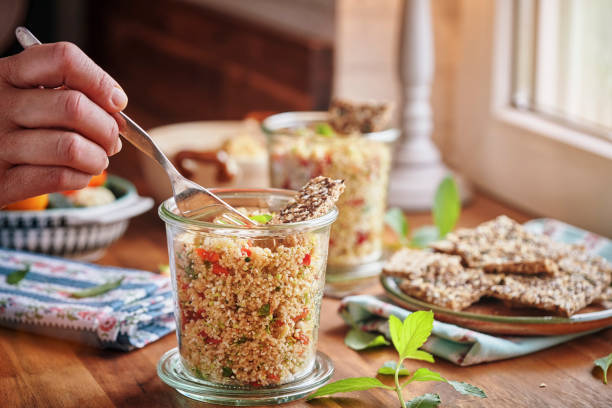 istock Couscous with Paprika, Tomato, Fresh Mint and Crispbread 959929800