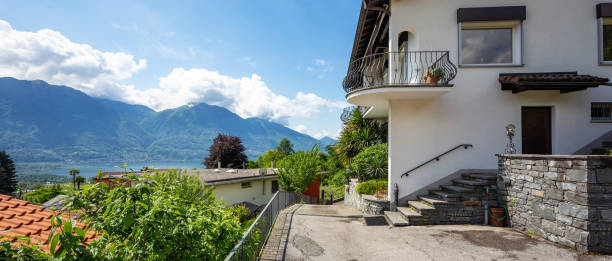 istock Exterior of villa with large square 959933650