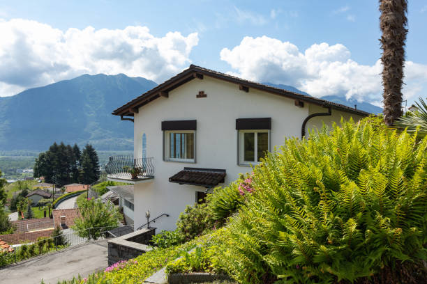 istock Exterior of villa with large square 959934690