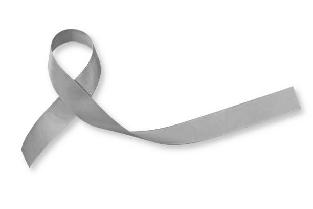 istock Brain cancer grey color awareness ribbon isolated on white background (clipping path) 959934830