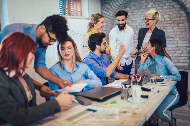 istock Business people working in office together. Team work in office. 959934858