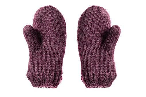 Pair of warm knitted mittens isolated over white