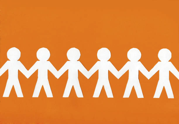 istock white paper men on a bright orange background 959938858