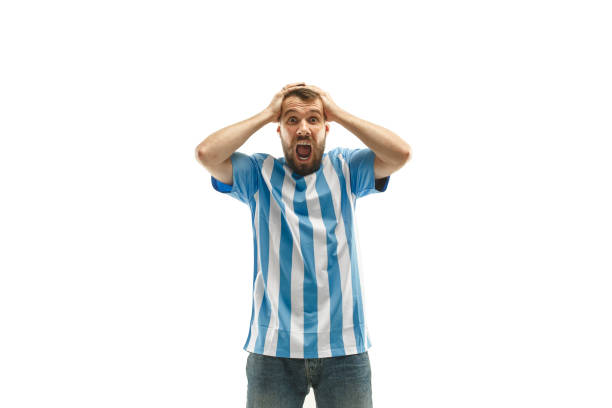 istock The unhappy and sad Argentinean fan on white background 959943006
