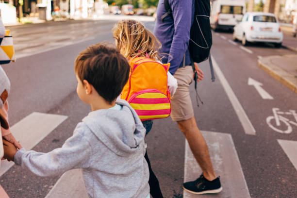 istock Children on their way to school 959947690