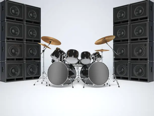 Photo of Drum kits and guitar amps