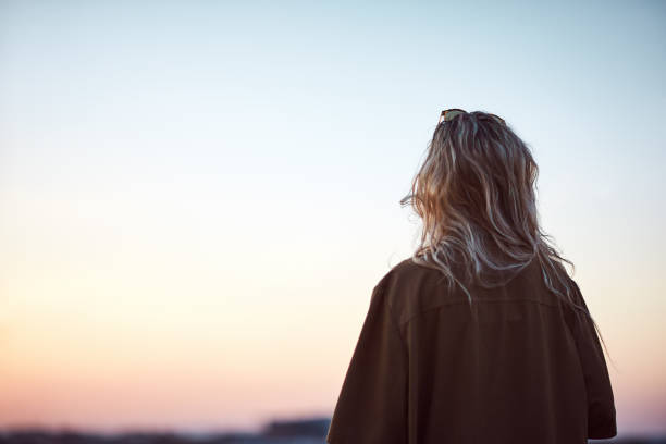 istock Woman looking at horizon. 959955742