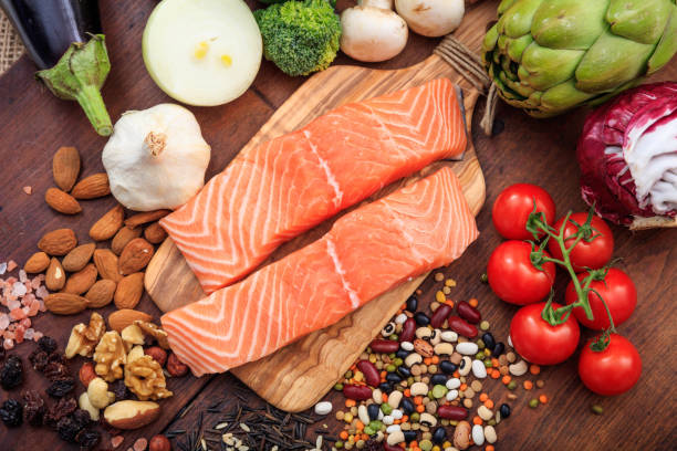 istock Two raw salmon fillets on wooden background 959955870