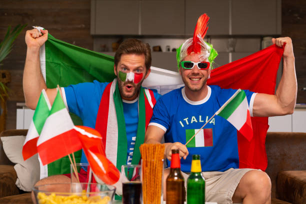 istock two real soccer fans supporting italy 959960722