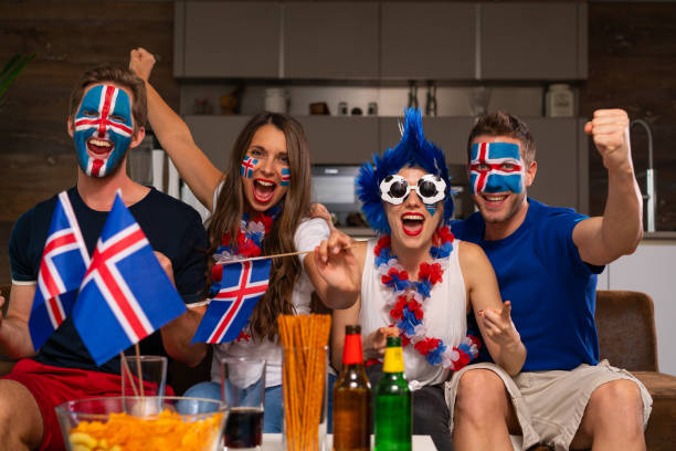 istock soccer fan party at home 959960804
