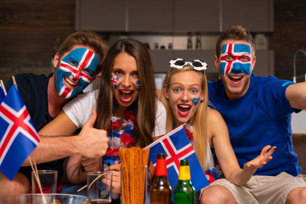 istock excited iceland soccer fans 959961500